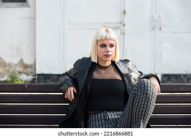 Young Beautiful Strong Independent Rebel Blonde Woman Punk Music And Style Fan Posing. Confident Punk-Rock Youth Culture Street Style Concept.