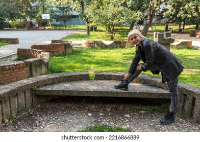 Young Beautiful Strong Independent Rebel Blonde Woman Punk Music And Style Fan Posing. Confident Punk-Rock Youth Culture Street Style Concept.