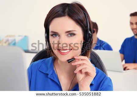 Young beautiful technical support dispatcher working in office, closeup