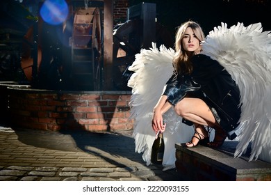 A Young Beautiful Woman Angel With White Wings