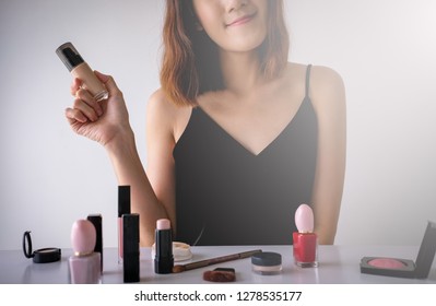 Young Beautiful Woman Applying Make Up. Beauty Blogger Influencer And Net Idol Concept.