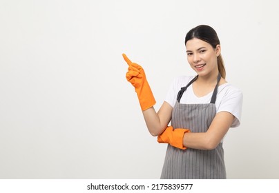 Young beautiful woman with apron and rubber glove standing open hands palm up on isolated white background. Housekeeping housework or maid worker concept.