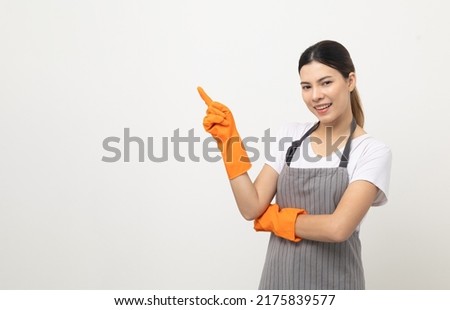Young beautiful woman with apron and rubber glove standing open hands palm up on isolated white background. Housekeeping housework or maid worker concept.