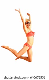 Young beautiful woman in bikini jumping high showing fun happy emotoins . The color of the swimsuit is coral. Model isolated on a white background