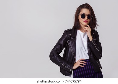 Young Beautiful Woman In A Black Jacket