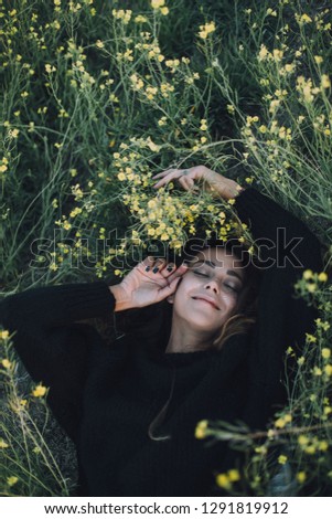 Similar – a girl with a white lily and closed eyes