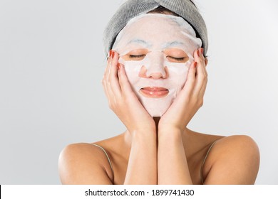 Young and beautiful woman with a clean mask on her face. - Powered by Shutterstock