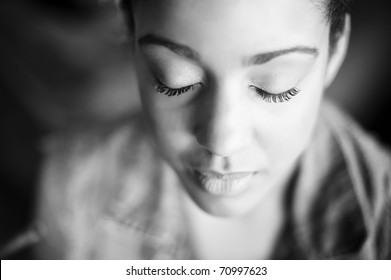 Young beautiful woman with closed eyes