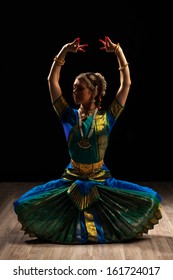 Young beautiful woman dancer exponent of Indian classical dance Bharatanatyam