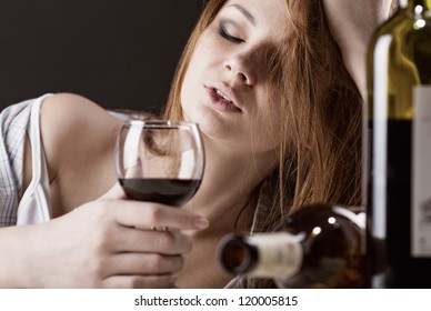 Young Beautiful Woman In Depression, Drinking Alcohol