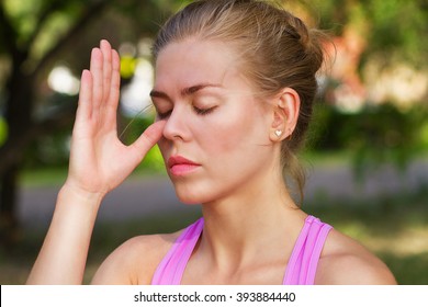 Young Beautiful Woman Doing Breathing Exercise, 