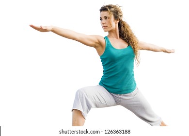Young Beautiful Woman Doing Yoga Warrior Pose isolated on white background.candid,color image with copy space isolated on white.