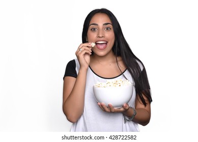 Young Beautiful Woman Eating Popcorn. Isolated White Background