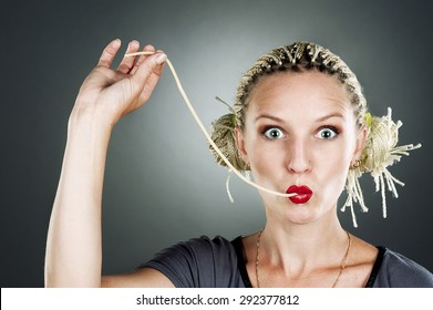 Young Beautiful Woman Eating Spaghetti