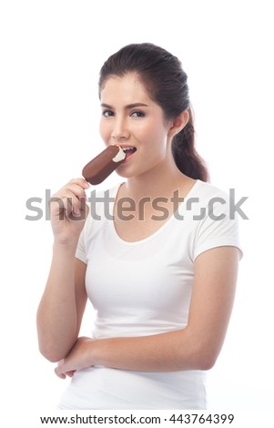 Young beautiful woman enjoy with ice cream, folded arm, hold ice cream on hand. Isolated white background, white t-shirt.
