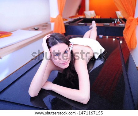 Similar – Image, Stock Photo Woman stretching on yoga mat in a yoga studio