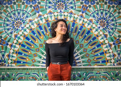 Young beautiful woman exploring the Hassan II Mosque