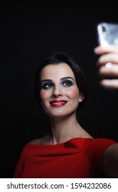 Young Beautiful Woman With Fancy Prom Makeup Making Selfie, Selective Focus