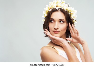 Young Beautiful Woman In Flower Crown