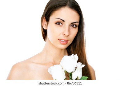 Young beautiful woman with flowers on white background