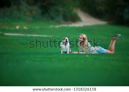 Similar – Image, Stock Photo Loving young woman offered a paw by her dog