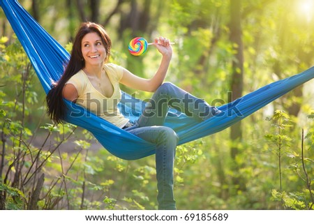 young beautiful woman in a hammock