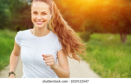 Young Beautiful Woman Jogging Workout Training