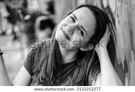 Similar – Portrait of a beautiful young woman outdoor smiling