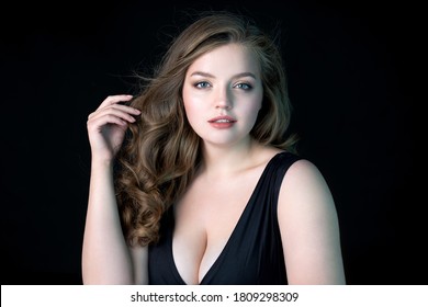 Young Beautiful Woman With Natural Makeup On Black Background. Beauty  Skin Care Concept. Plus Size Model.