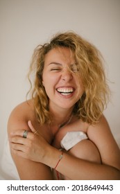 Young Beautiful Woman With No Make Up And Perfect Skin On White Background.