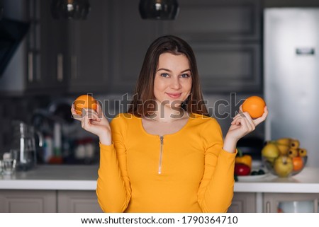 young beautiful woman with orange