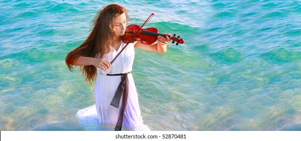 young beautiful woman playing violin in water