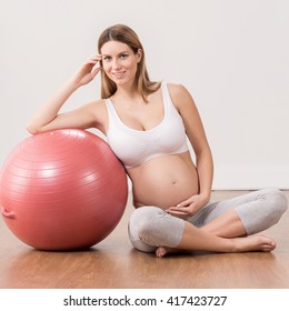 Young Beautiful Woman In Pregnant On Her Antenatal Class