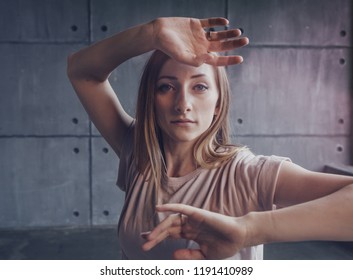 Young Beautiful Woman Professional Dancer Dancing During A Rehearsal In A Dance Studio, Modern Dramatic Style, Experimental Dance