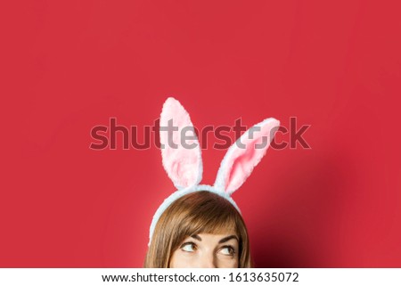 Similar – Young blonde woman wearing rabbit ears