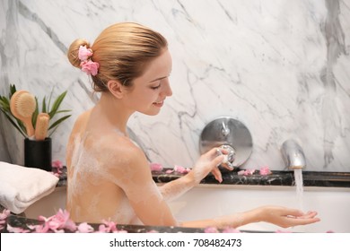 Young Beautiful Woman Relaxing In Bath With Foam