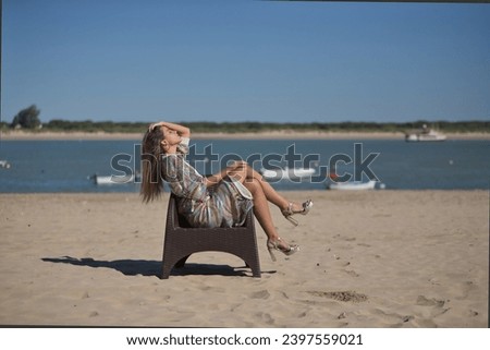 Similar – Young woman and Labrador at the Baltic Sea beach