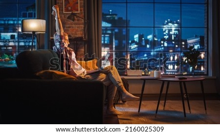 Similar – Image, Stock Photo Young beautiful woman sits inside window frame