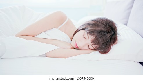 Young Beautiful Woman Sleeping Well And Relaxing In The Morning