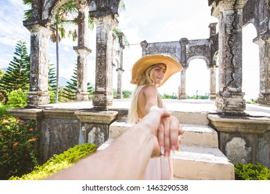 Young Beautiful Woman In Taman Ujung Water Palace, Bali Island, Indonesia - Travel Blogger Exploring Water Palace In Bali