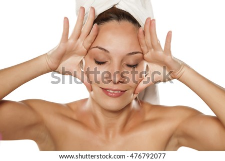 Similar – Young woman receiving a head massage in a spa center