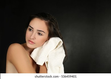 Young Beautiful Woman Towel Drying Her Hair After Shower