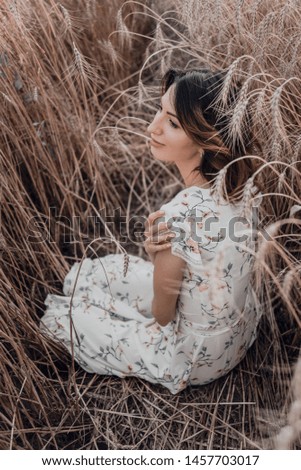 Similar – Image, Stock Photo Woman in her back with the hands in the head enjoying the nature.