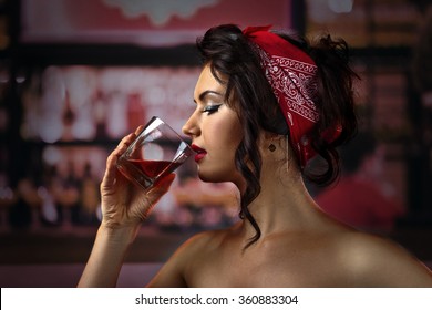  Young Beautiful Woman With Whiskey In Bar