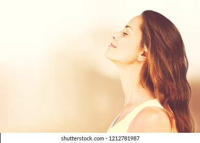 Young beautiful woman in white shirt outdoors