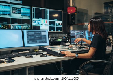 Young Beautiful Woman Working In A Broadcast Control Room On A Tv Station