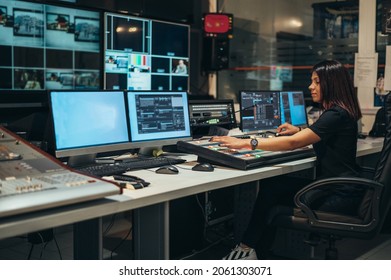 Young Beautiful Woman Working In A Broadcast Control Room On A Tv Station