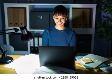 Young Beautiful Woman Working At The Office At Night With A Happy And Cool Smile On Face. Lucky Person. 