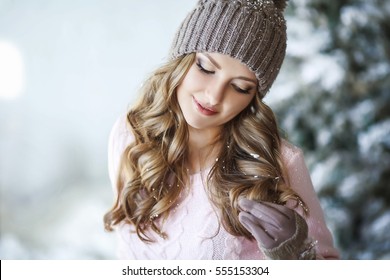 Young Beautiful Woman Worries About The Condition Of Hair In Winter