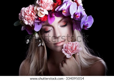 Similar – Young blonde woman posing with a huge daisy